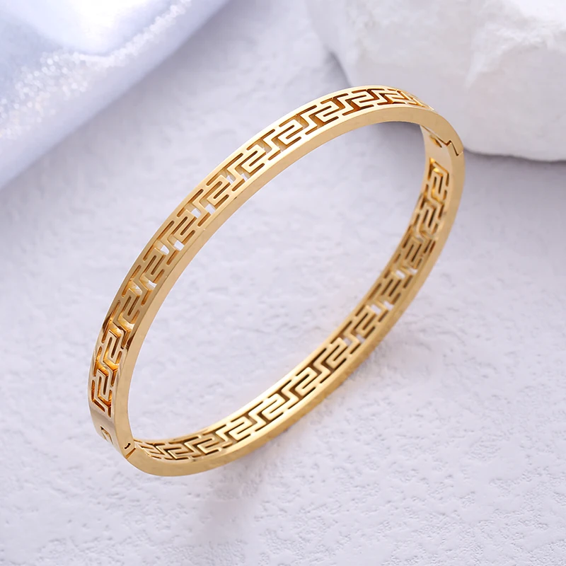 Fashionable Stainless Steel Oval Opening Bracelet Hollowed out Bow Shaped with Great Wall Pattern for Women Holiday Celebrations