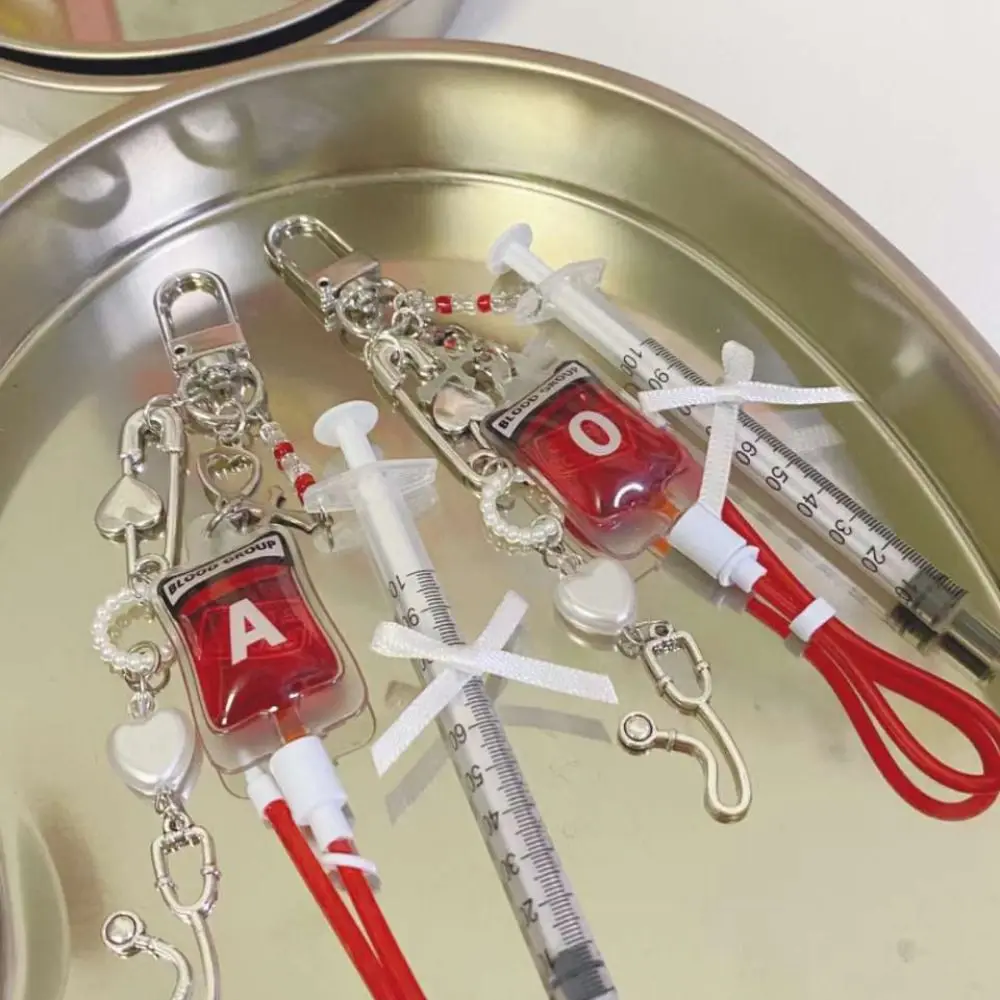 

Keyring Type A B O AB Plasma Blood Bag Keychain PVC Unique Blood Bag Pendant Bag Charm Fashion Mobile Phone Straps DIY Accessory