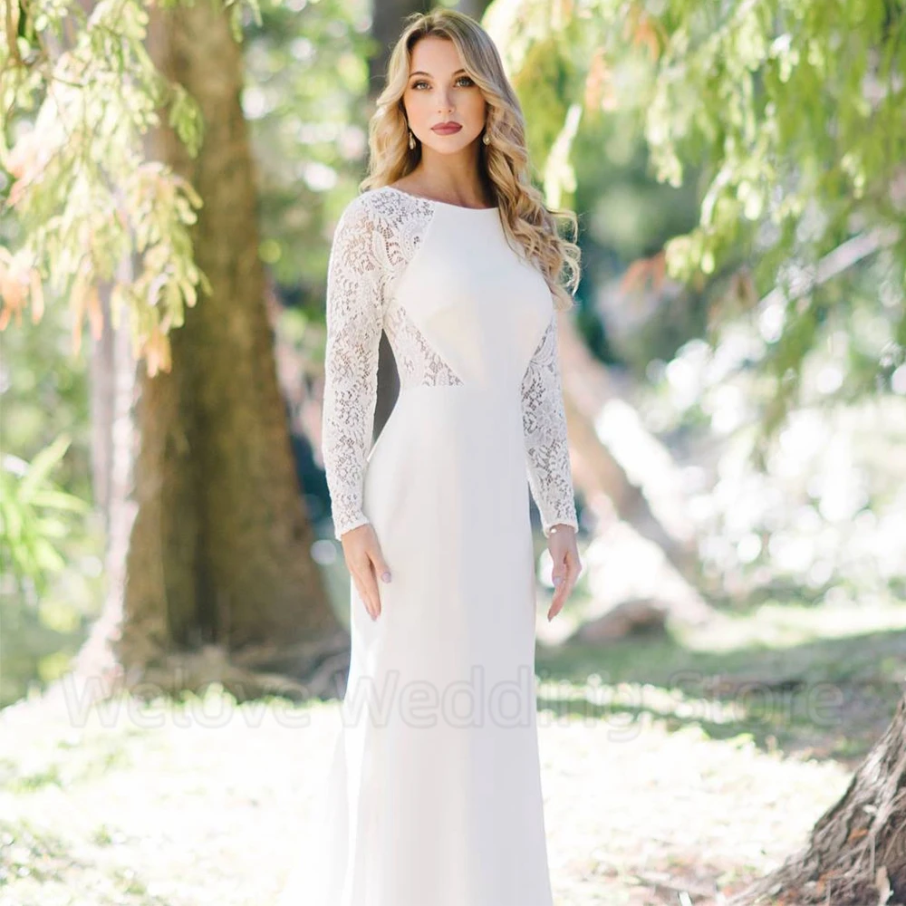 Abito da sposa Vintage a sirena scollo tondo in pizzo maniche lunghe illusione Sexy indietro con bottoni abiti da sposa lunghi fino al pavimento