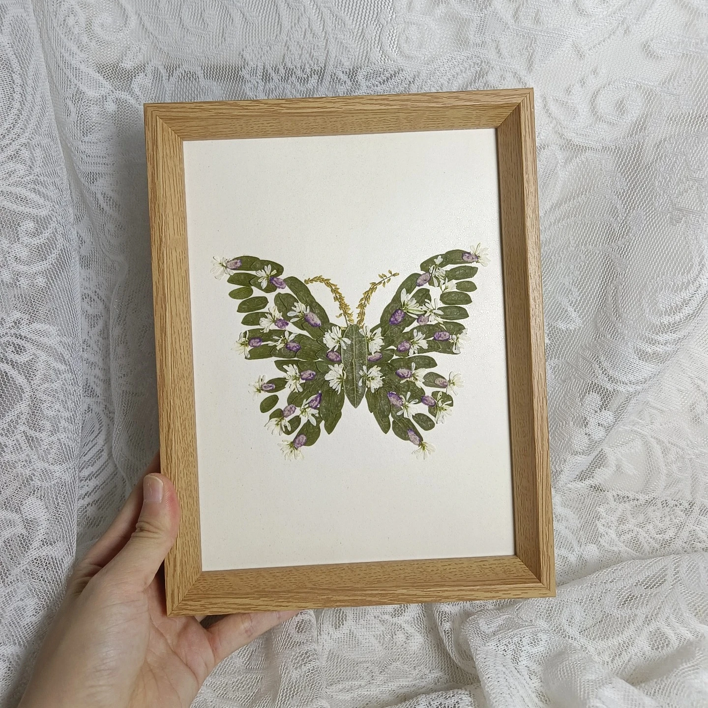 

0058 Handmade Pressed Flower Butterfly Art Wall Decor with Green Leaves White Flowers and Purple Accents Natural Fresh Style
