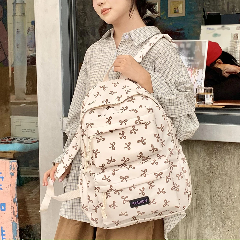 حقيبة ظهر مدرسية مطبوعة على شكل فيونكة حقيبة ظهر جامعية Preppy حقيبة مدرسية متوسطة للفتيات المراهقات