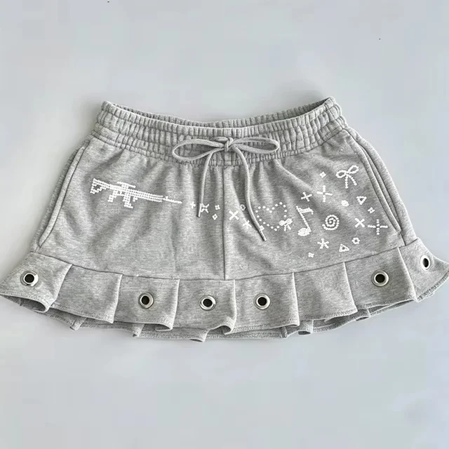 Y2K Rhinestone Mini Skirt Women Drawstring Elastic Waist Ruffle Hem Skirt Gothic Eyelet Pleated Short Skirt Cute Music Note Hear