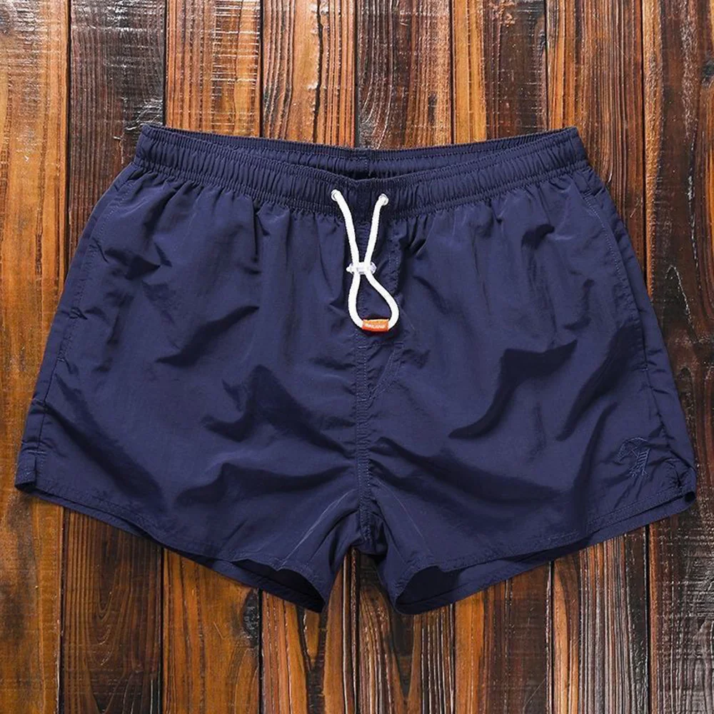 Pantalones cortos deportivos para hombre, Shorts de secado rápido, holgados, versátiles, informales, para playa, verano, 2024