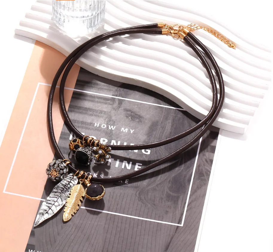 

Bohemian national wind multi-layer leather rope leaf temperament necklace
