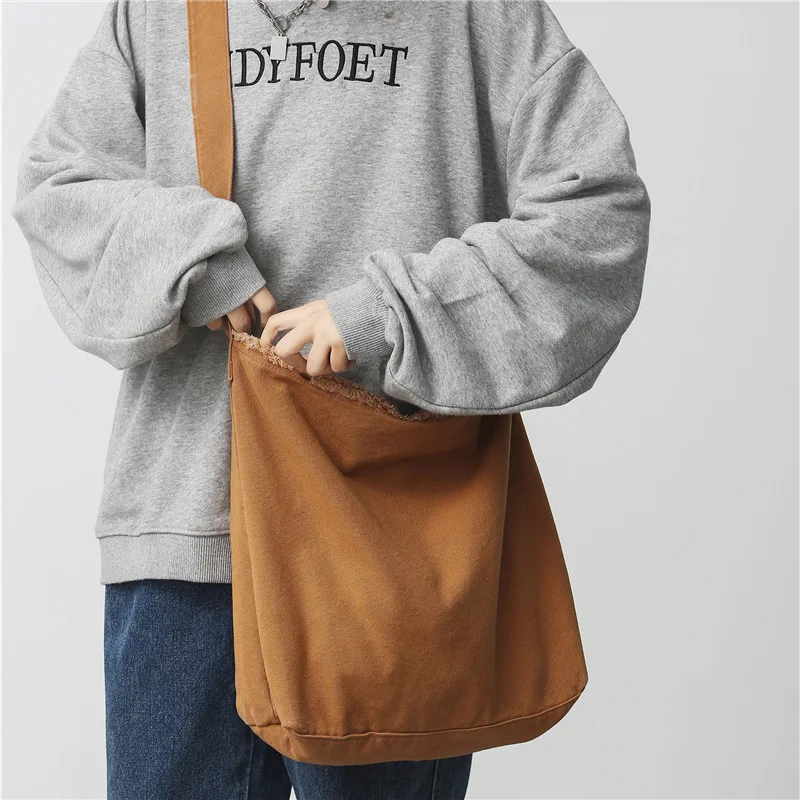 Crossbody bag women's simple canvas bag hand bill shoulder bag Large capacity shopping bag personality raw edge bucket bag