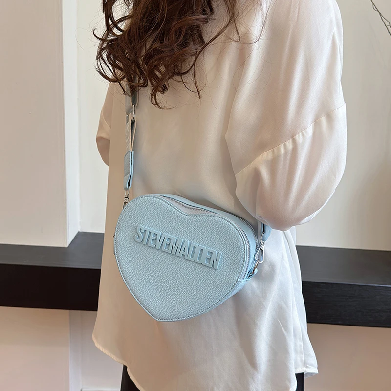 Contemporary Saddle Shoulder Bag In Buttery Soft Leather Streamlined Design For Gallery Visits And Business Luncheons