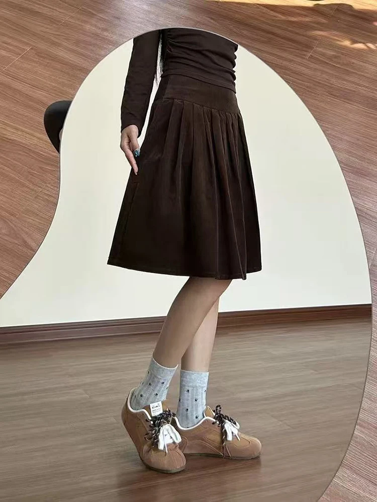 الشتاء خمر سروال قصير تنورة المرأة Y2K عالية الخصر الشارع الشهير الدافئة فضفاض مطوي تنورة السيدات الكورية كل مباراة طول الركبة تنورة