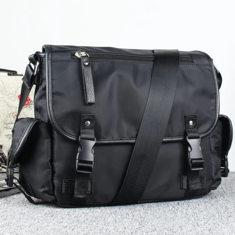 

【New style】Men's bags shoulder bag casual nylon backpack Oxford spinning horizontal travel bag casual backpack hair agency.