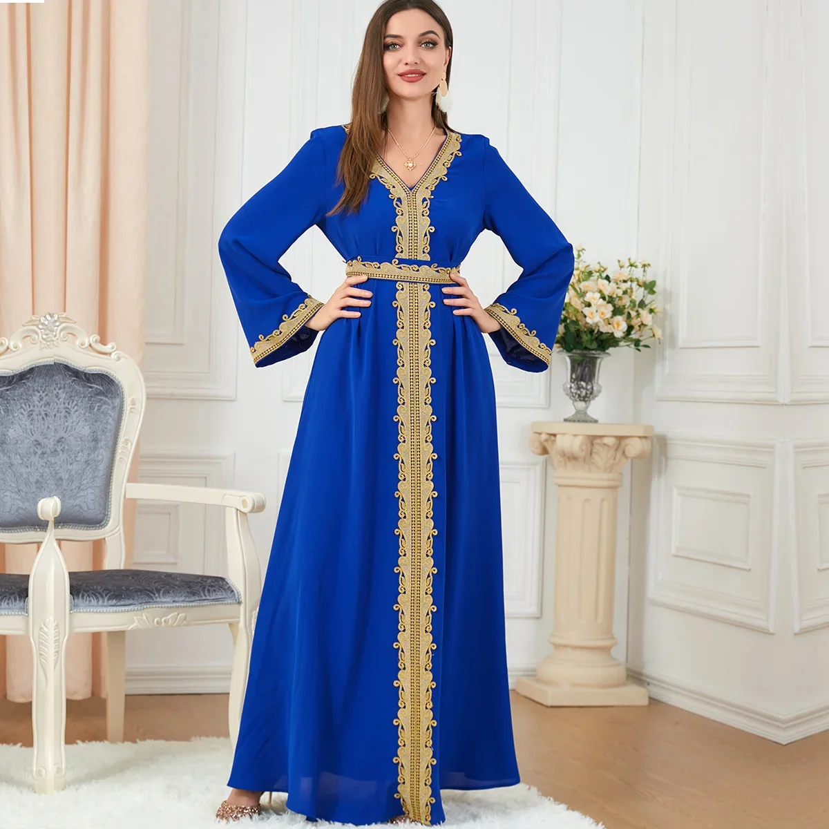 

A solid-color spliced long robe for Middle Eastern Muslim women, a fashionable embroidered dress with a V-neck and long sleeves.