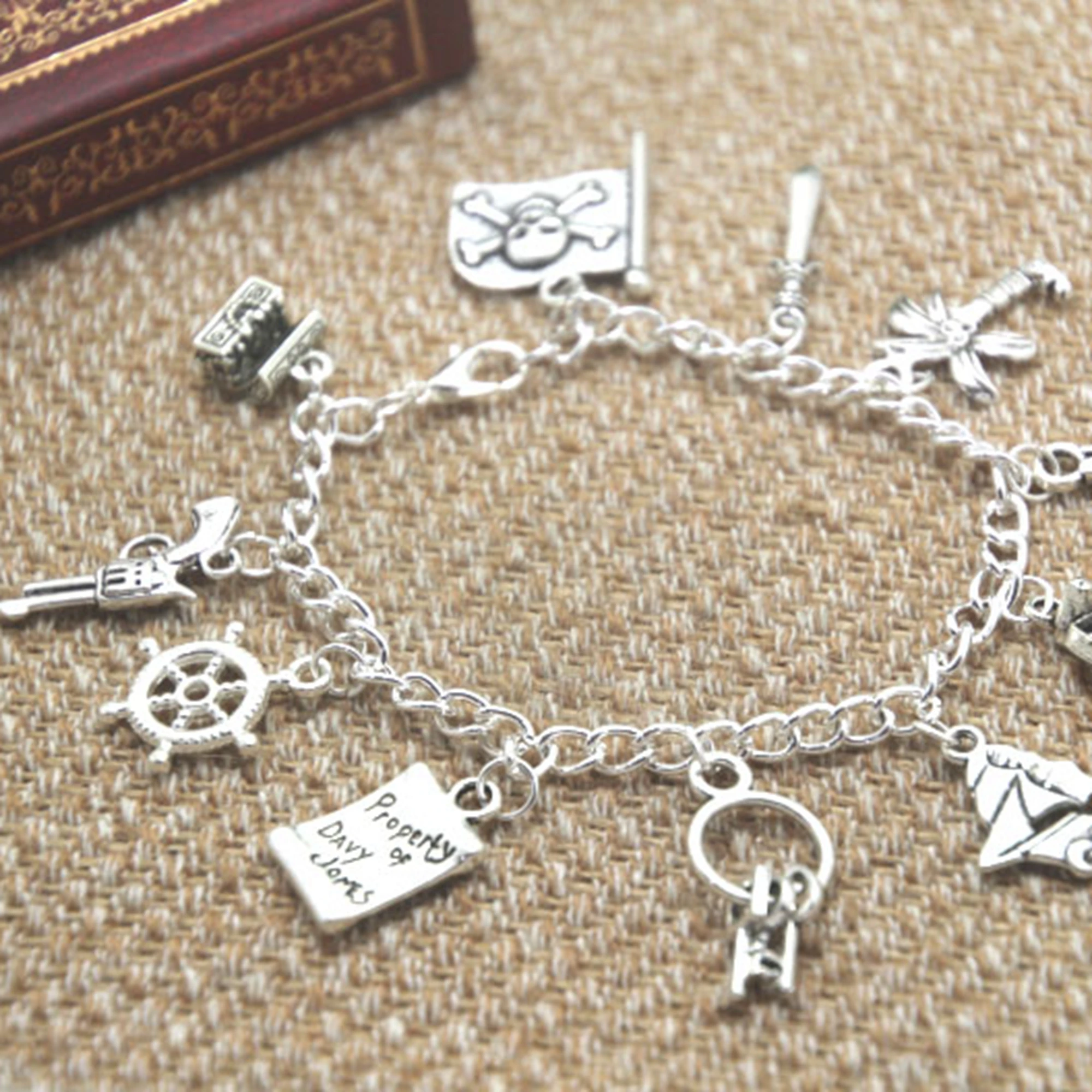 12pcs Pirates of the Caribbean Inspired Charm Bracelet Jewelry Silver Tone