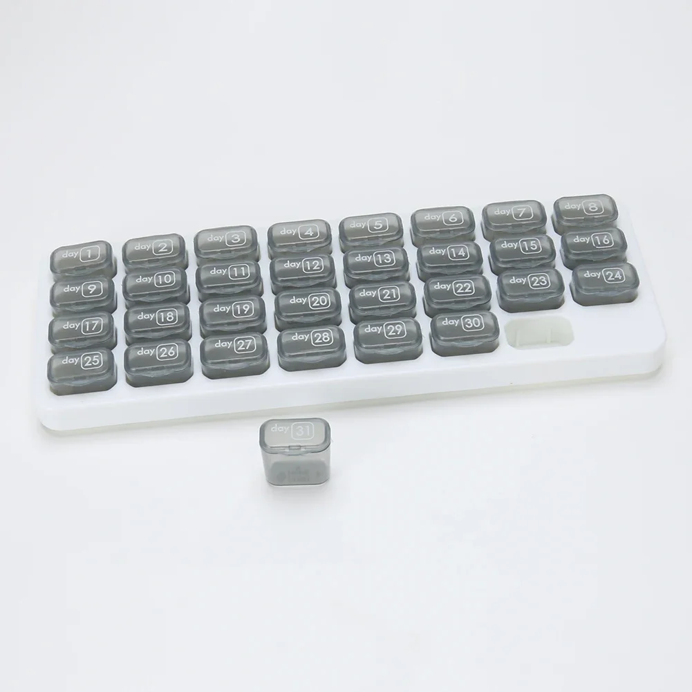 Dispenser di pillole mensile da 31 giorni Scatola portapillole portatile Custodia per medicinali a forma di tastiera per pillole di olio di fegato di merluzzo e vitamine
