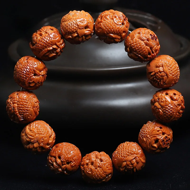 

Круглый оливковый камень с играющим на карпа, полый резной браслет на удачу