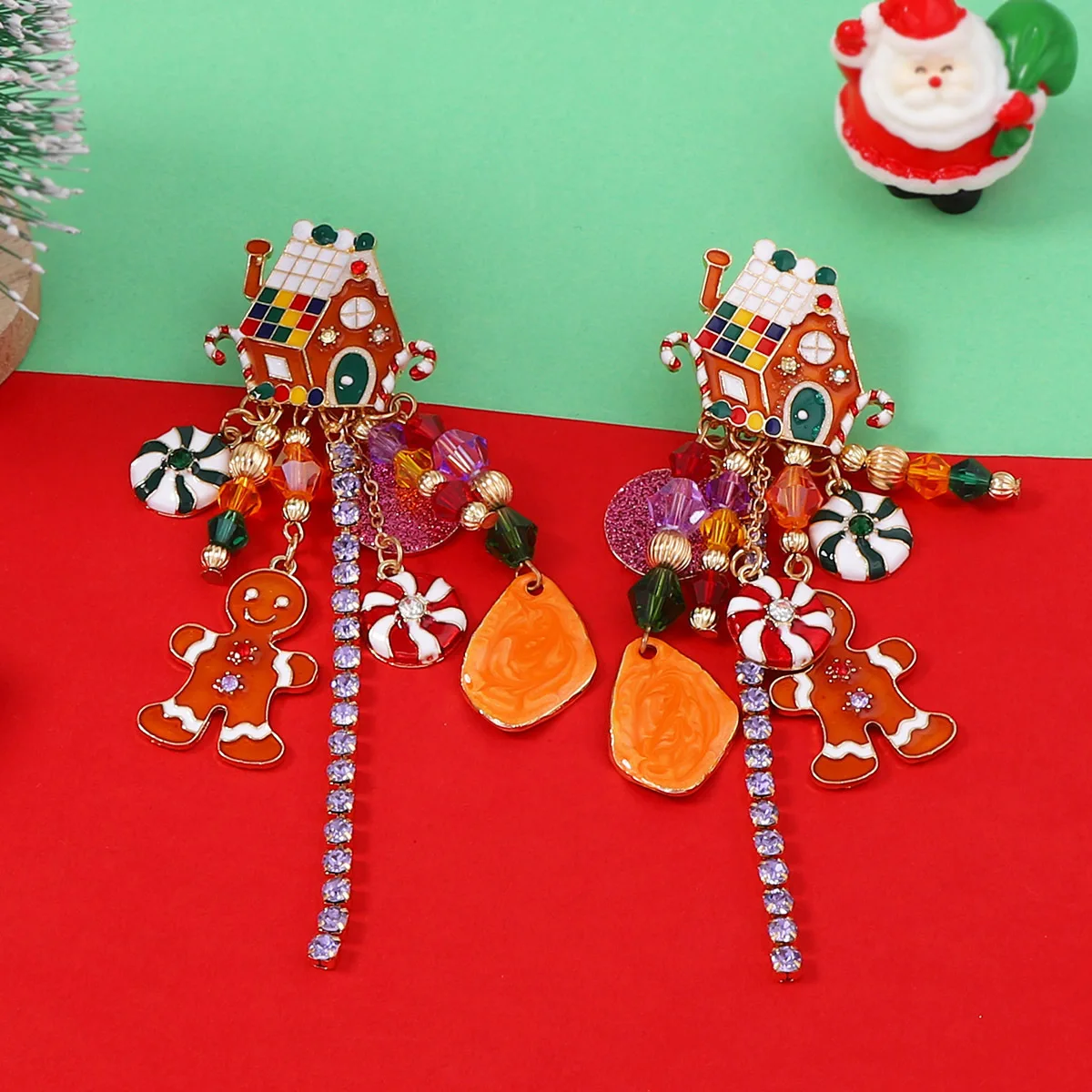 Christmas earrings niche design sense alloy drip gingerbread man cartoon color house fringed women's earrings