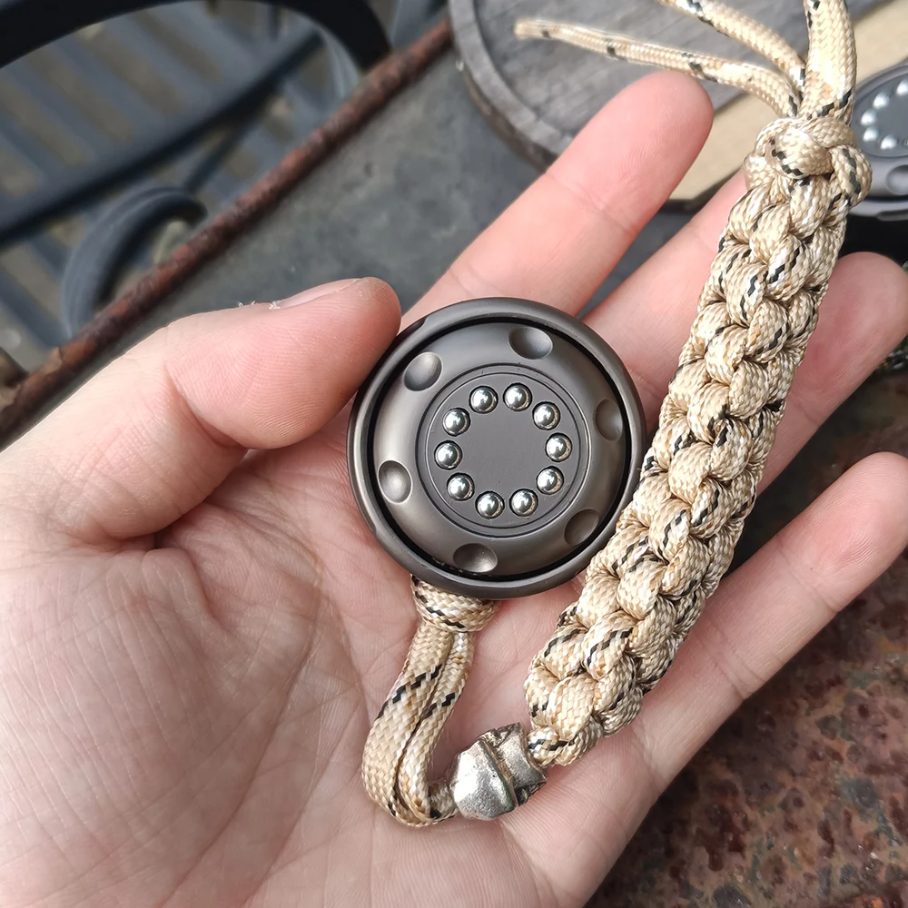 EDC عملة معدنية تململ سبينر دفع وسحب السقاطة اللمس الضغط تململ سبينر لعبة قلادة