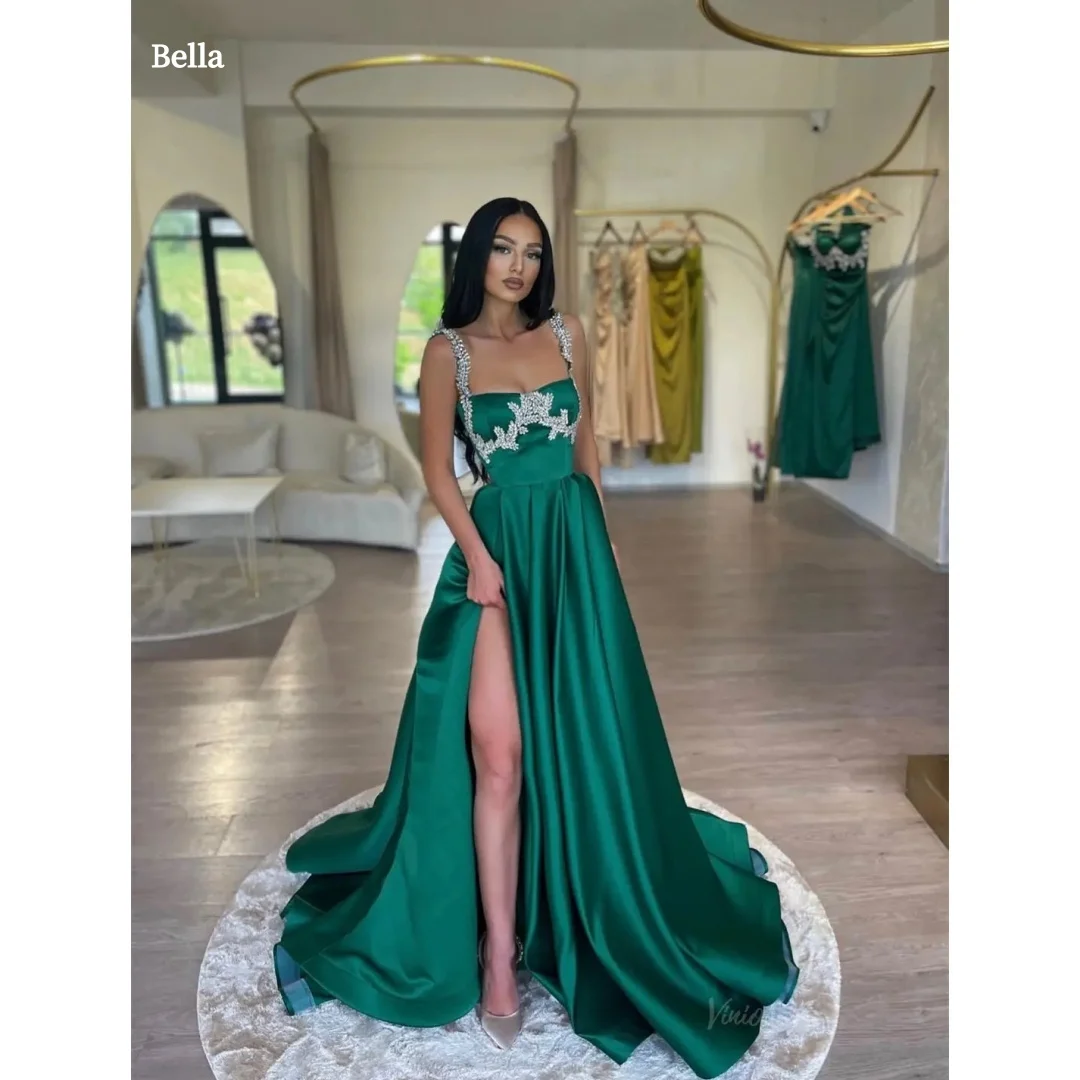 

Изысканное вечернее платье Bella на бретельках изумрудно-зеленого цвета с бисерным лифом, атласной юбкой А-силуэта и высоким разрезом