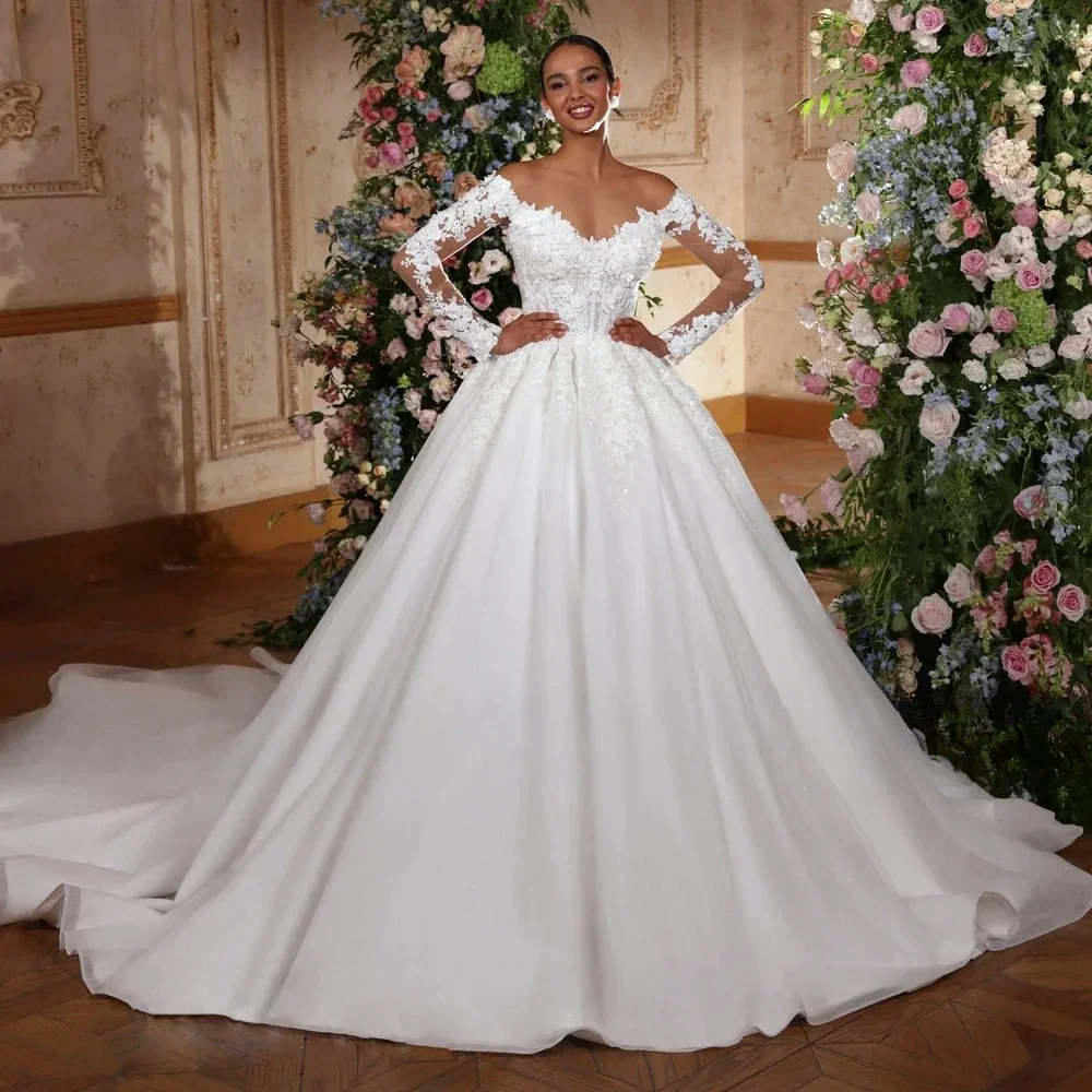 Flavinke Maßgeschneiderte romantische herzförmige Ballkleid-Hochzeitskleider 2025, Applikationen, lange Ärmel, Spitze, glitzerndes Prinzessin-Brautkleid
