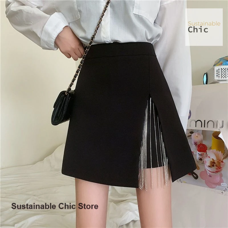 

Korean style black tassel split skirt women's spring and autumn plus size design sense high waist wild hip A-line skirt pants.