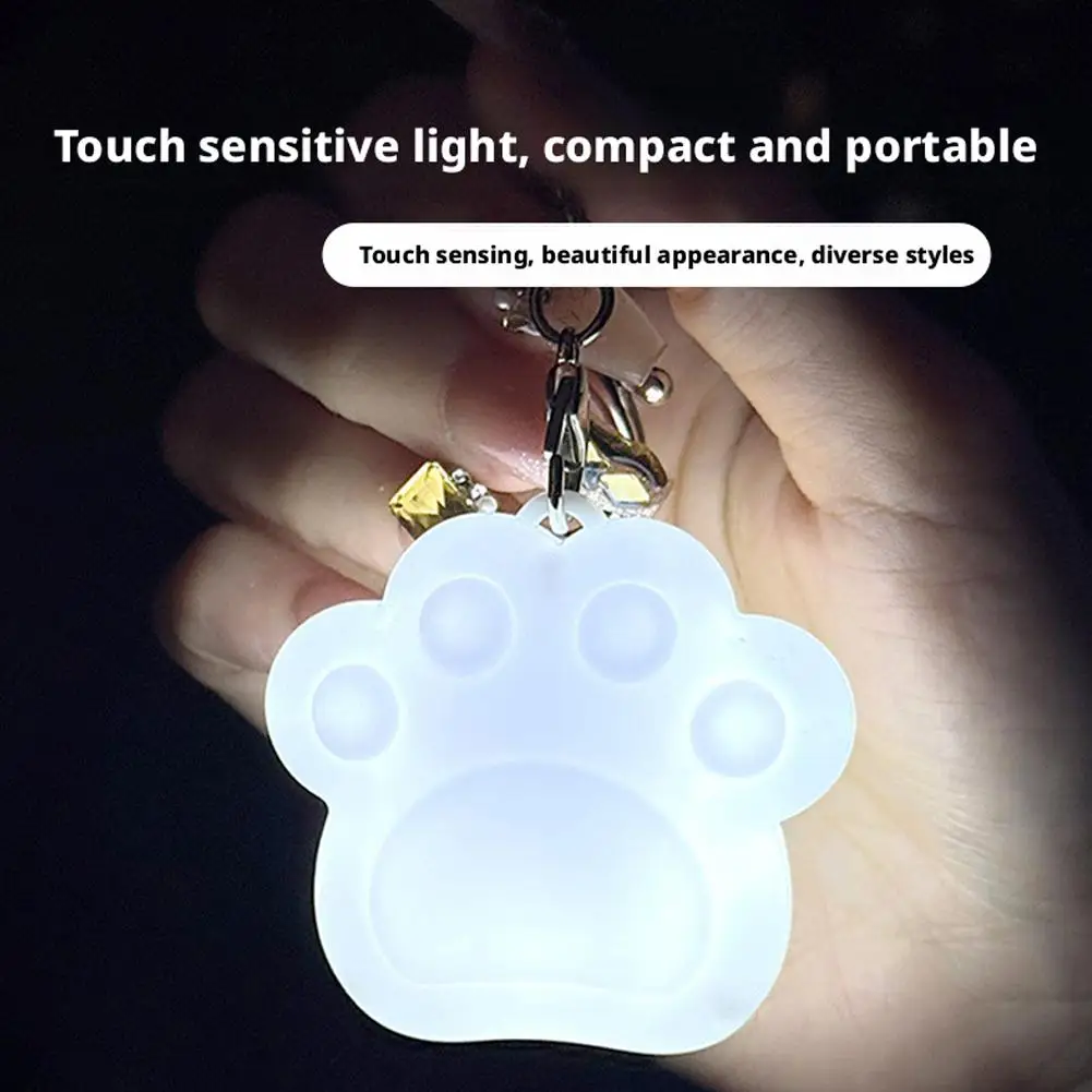 3-D Cute Heart Cat Claw Shape Touch Sensor Glowing LED Light Automatic Sensing Purse Keychain Creative Gift Night Light