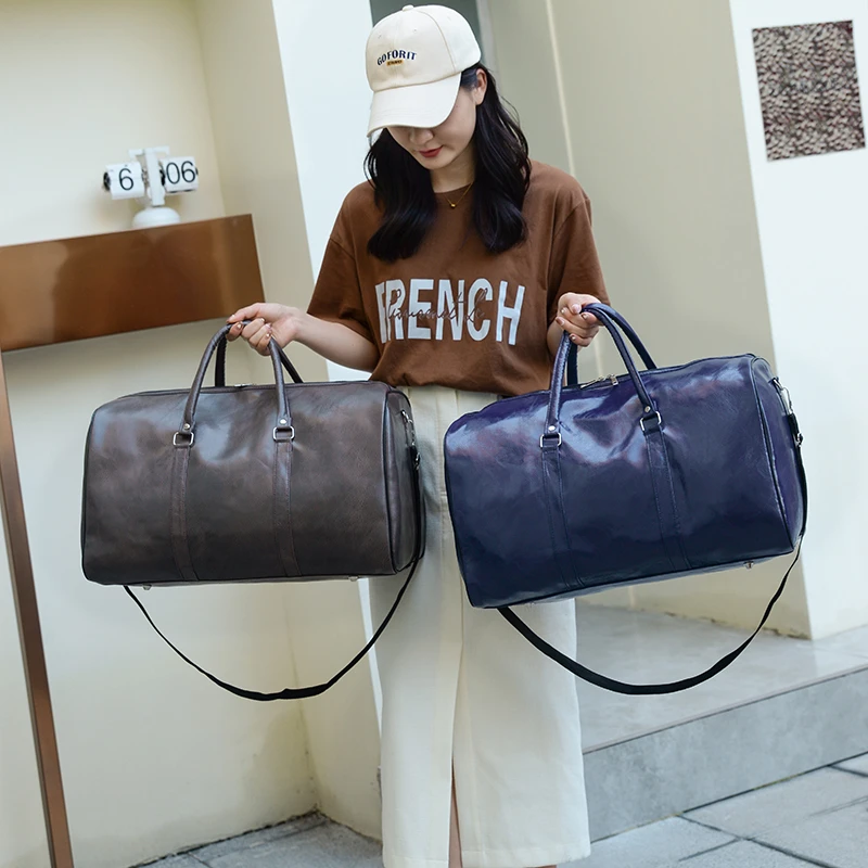 

High Quality Leather Travel Bags for Women Large Waterproof Handbag Men Weekend Travel Travel Duffle Luxury Shoulder Luggage Bag