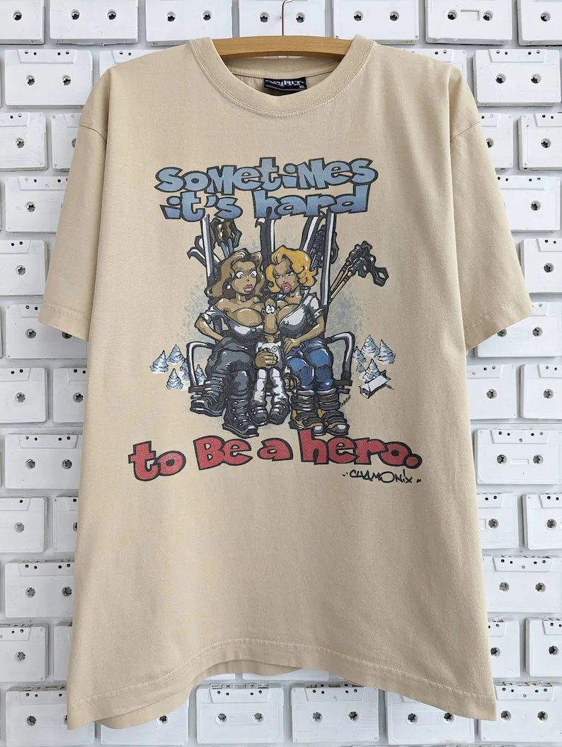 

Vintage 90s 00s Spirit Brand T-Shirt "Sometimes It's Hard To Be A Hero" Adult Joke Cartoon Skiing Style Graphic Tee Size XL