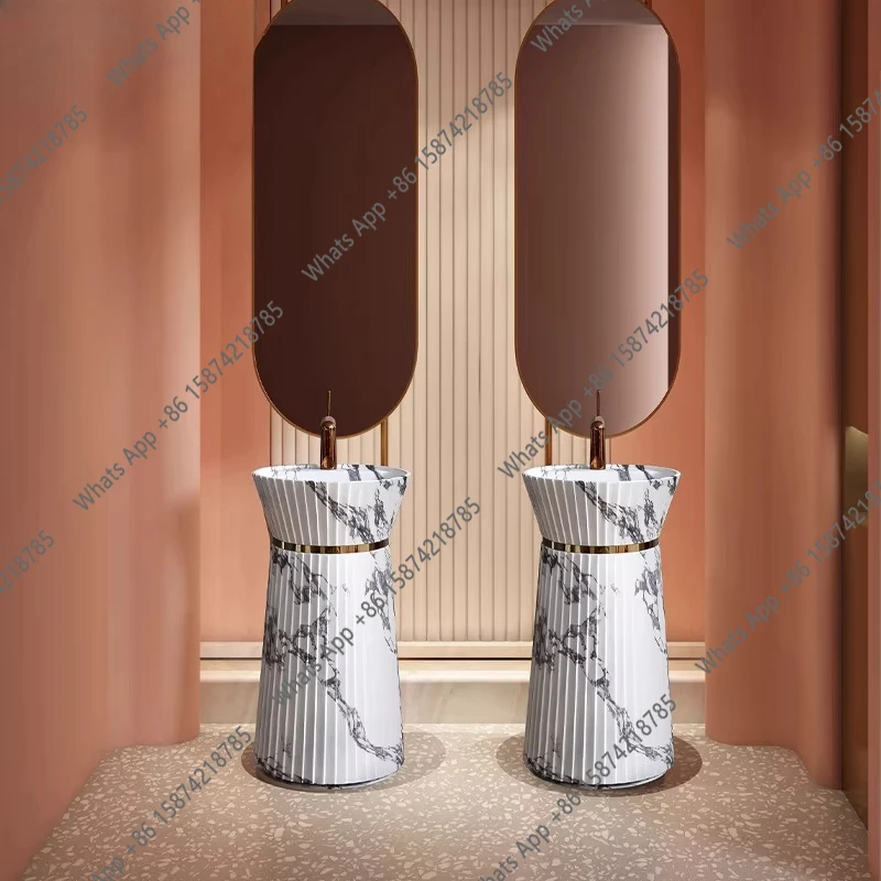 

Italian light luxury washing table creative stone pattern column basin integrated floor hotel art basin wash basin