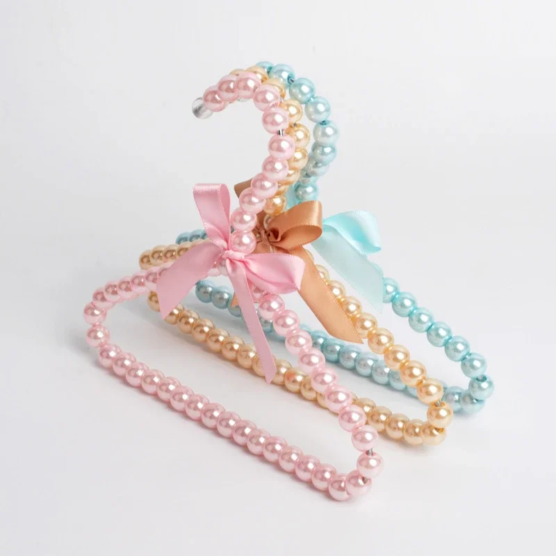 

5pcs Baby Clothes Hanger Pearl Bow Rack Dog Hanger Plastic Pearl Bead Clothes Hangers Pet Cat Clothing Kid Hangers Organizer