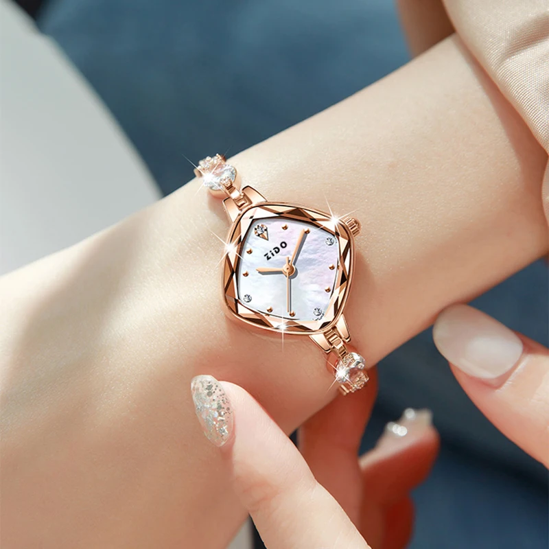 Alto nivel de apariencia Moda simple luz cristal de lujo con diamante deporte impermeable diamante 1409 reloj de mujer