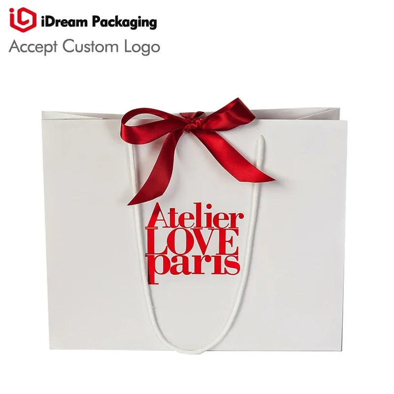 custom logo size Bags | Shopping Bag| Paper pouch | Retail sack| white color gift bag with red ribbon emboss logo red hot stamp