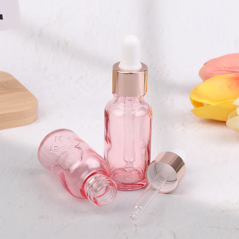 Bottiglie contagocce ricaricabili 5-100ML Coperchio rosa Contenitore cosmetico Pipetta liquida per aromaterapia in vetro rosa per massaggio essenziale