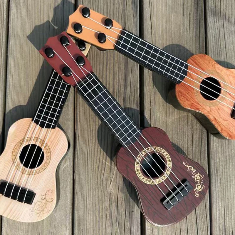 1 szt. 4-strunowa Mini Gitara Instrumenty Muzyczne Prezenty Zabawki Edukacyjne Wczesnoszkolne Dla Początkujących Dzieci Ukulele 21 Calowe