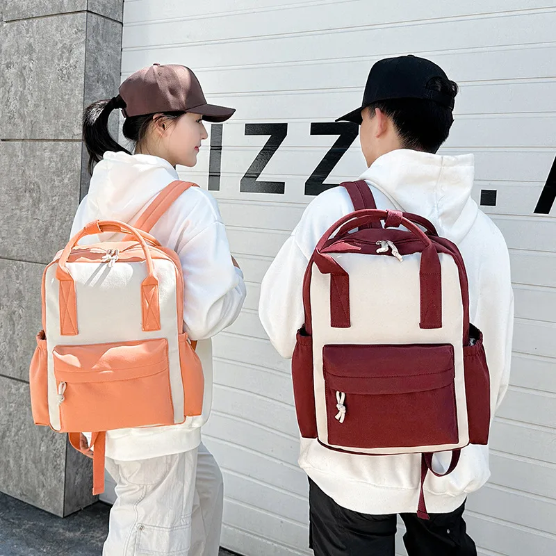 Compact nylon kindergarten schoolbag, cute color-matched patchwork children's waterproof hand-held double-shoulder backpack