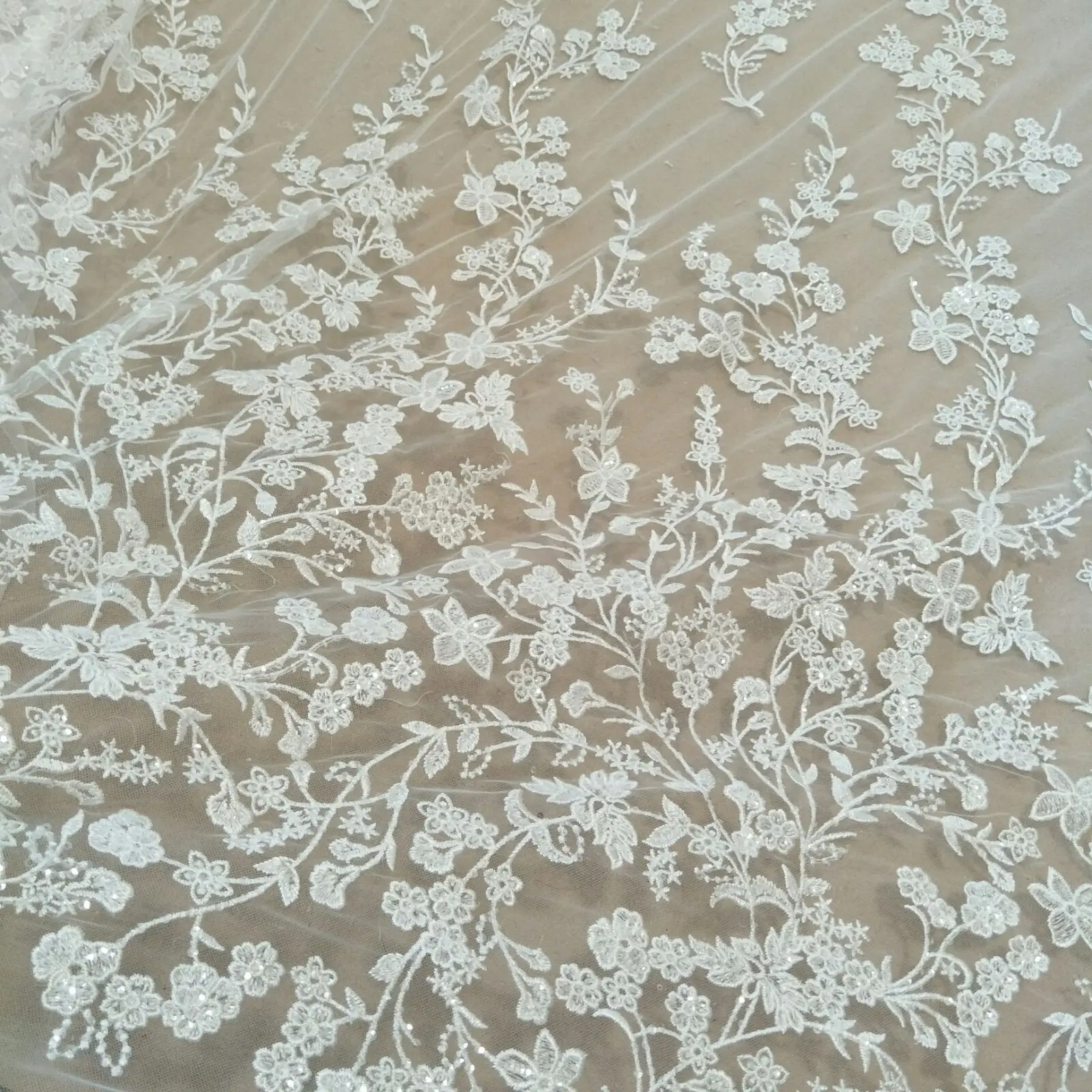 Latest flower lace fabric bridal lace fabric 130cm width ivory wedding dress lace fabric sell by yard