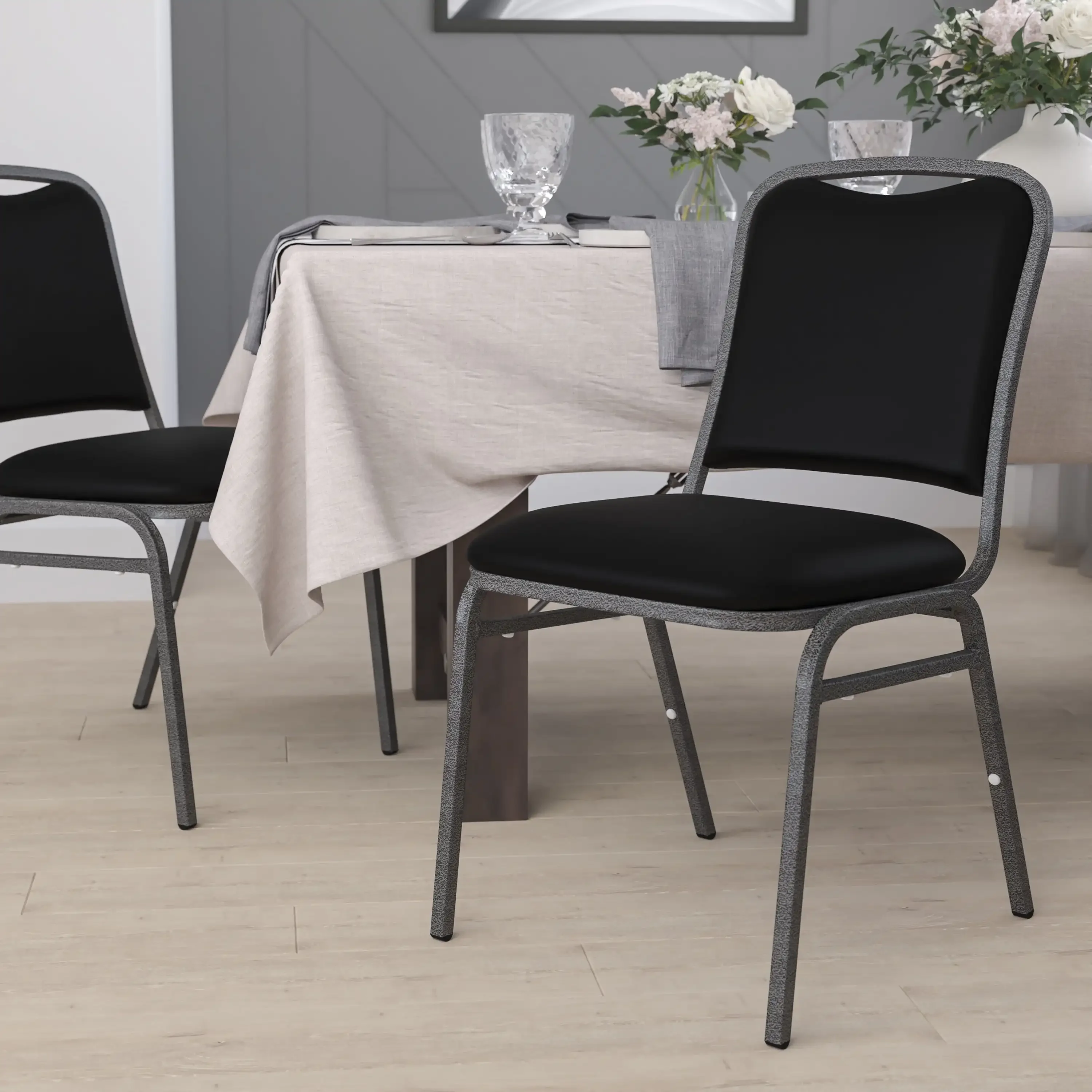 HERCULES Series Stacking Banquet Chair in Black Vinyl - Silver Vein Frame