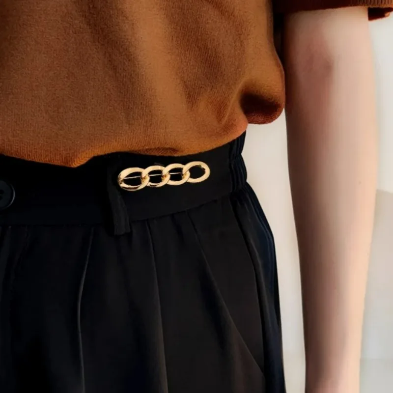 Hebilla de cintura Simple para apretar pantalones, cierre de aleación, ropa, dispositivo de ajuste de cintura retráctil, botón de cintura