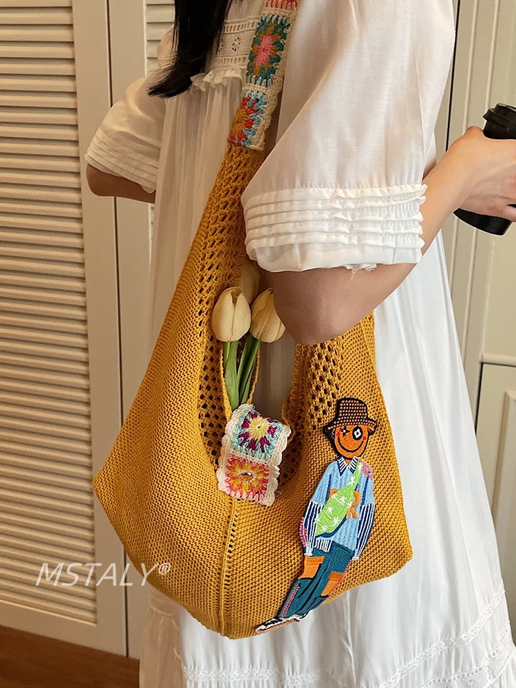 

2025 Japanese Cartoon Pattern Decoration Bucket Shaped Shoulder Bags Simple And Casual Versatile Woven Hollow Women's Bag Trendy