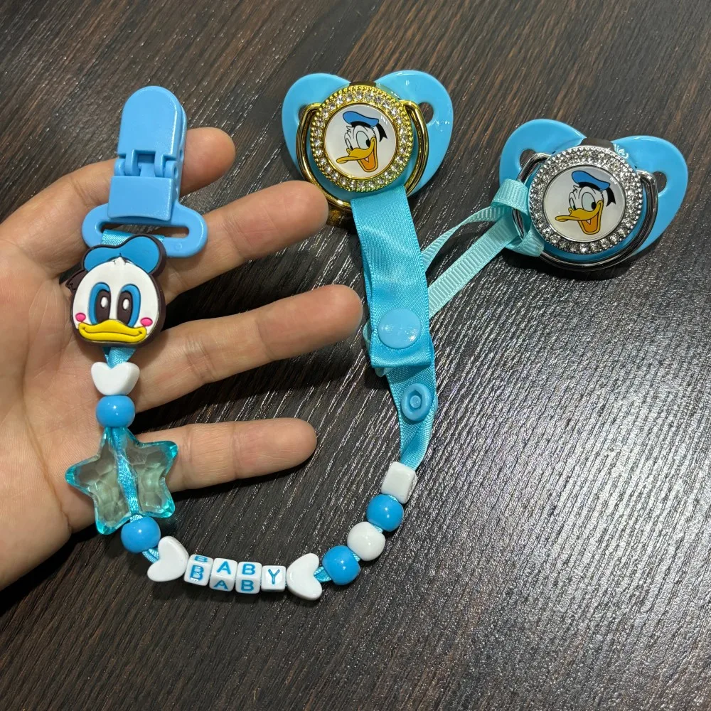 

Роскошная детская соска-пустышка с цепочкой-держателем. Ярко блестящая успокаивающая соска-пустышка для новорожденных. Цепочка для детской коляски Kawaii.