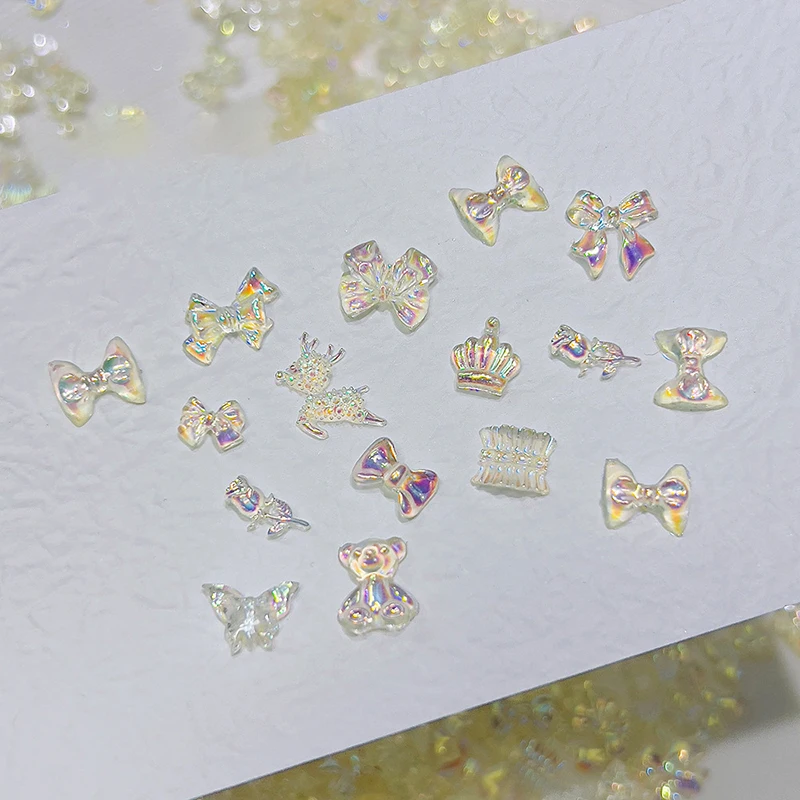 50 pezzi Auroras in resina trasparente con fiocco a forma di cuore per nail art, simpatico orso, farfalla, glitter, decorazione per unghie, accessori per gioielli