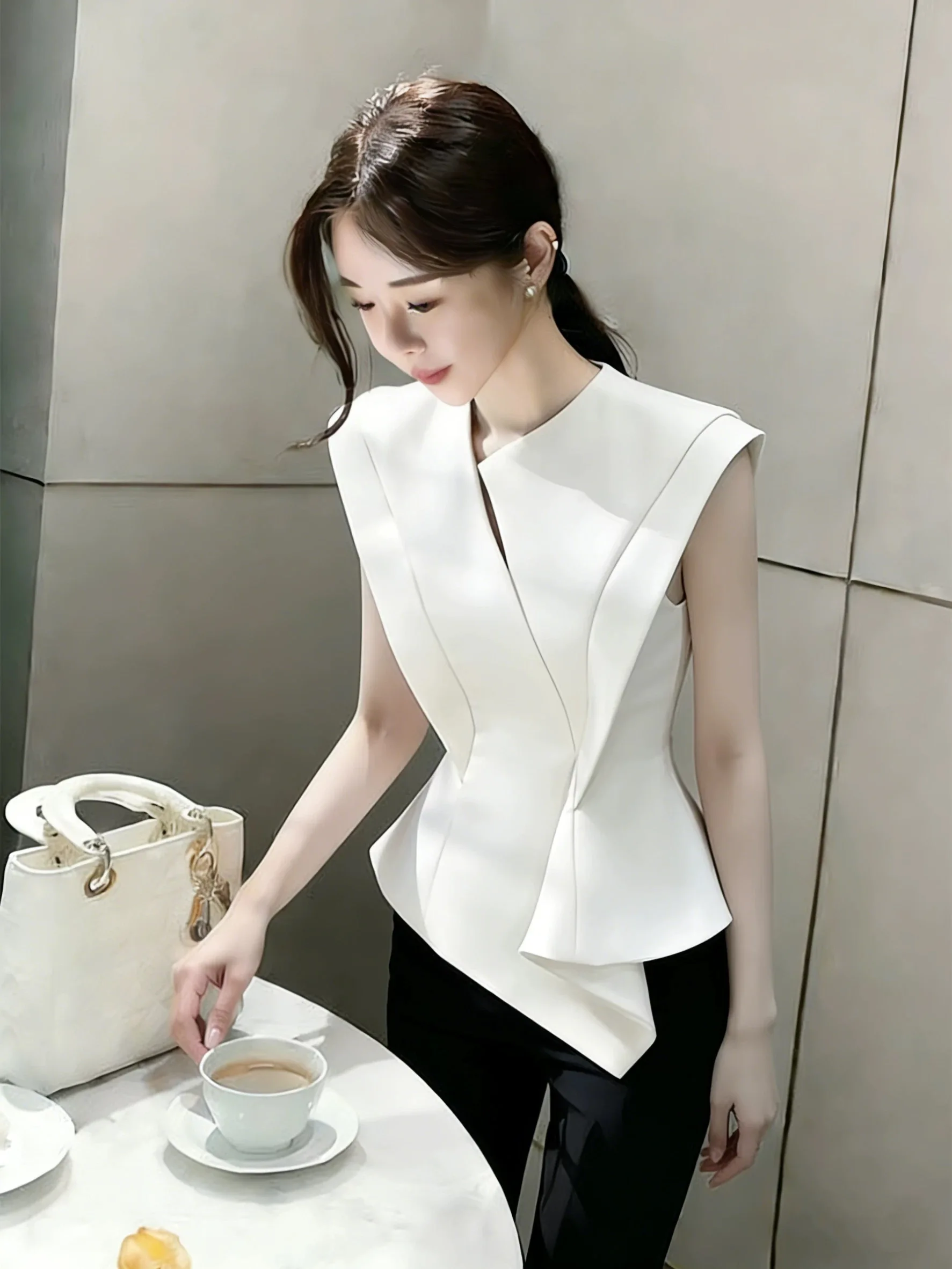 

Новая роскошная женская приталенная рубашка без рукавов во французском стиле, летняя, с асимметричным подолом, элегантный офисный топ для женщин