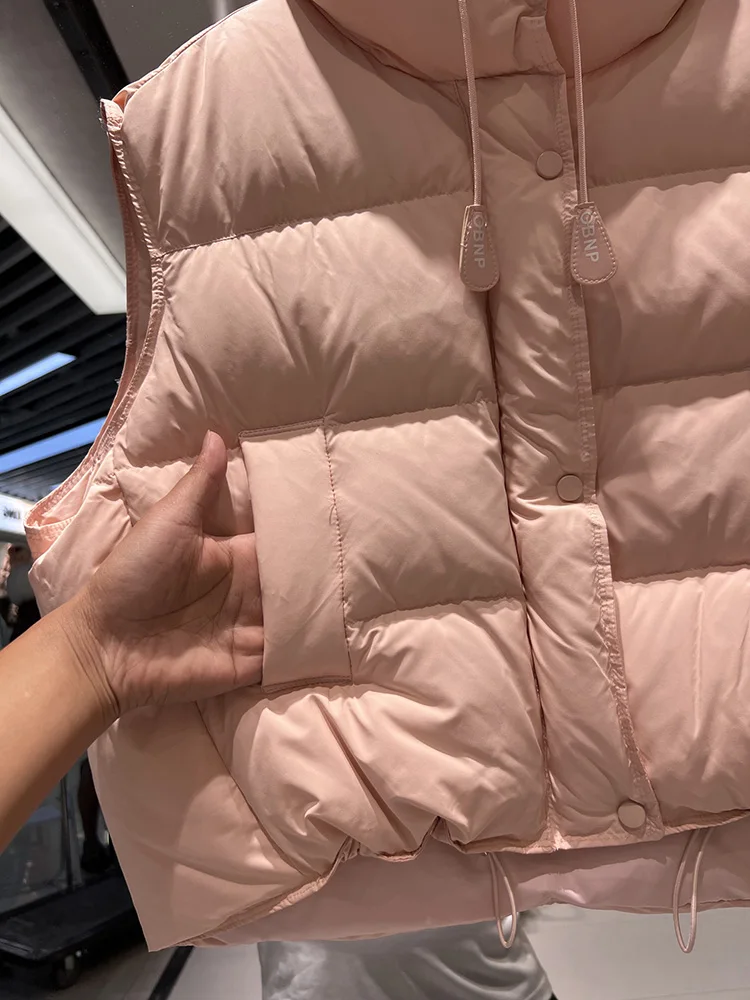 Women's short style stand collar down jacket vest 2025 winter new fashion design loose white duck down jacket trend