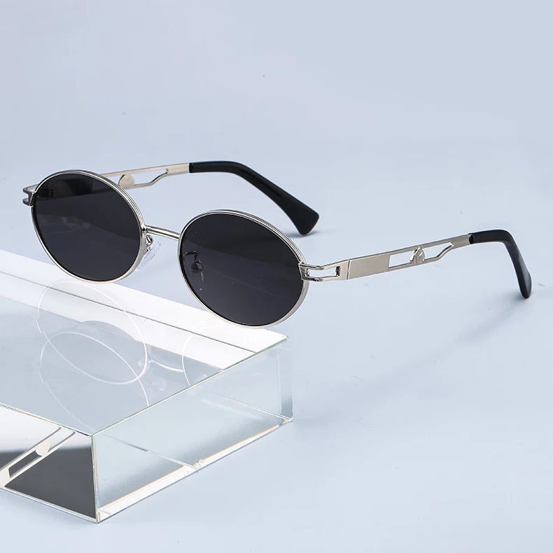 Women's Vintage Y2K Small Frame Hollow Metal Oval Sunglasses with UV400 for Outdoor Driving