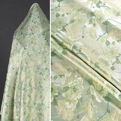 Light green woven satin jacquard fabric with gold border Kirin peony fashionable dress jacket DIY designer sewing fabric