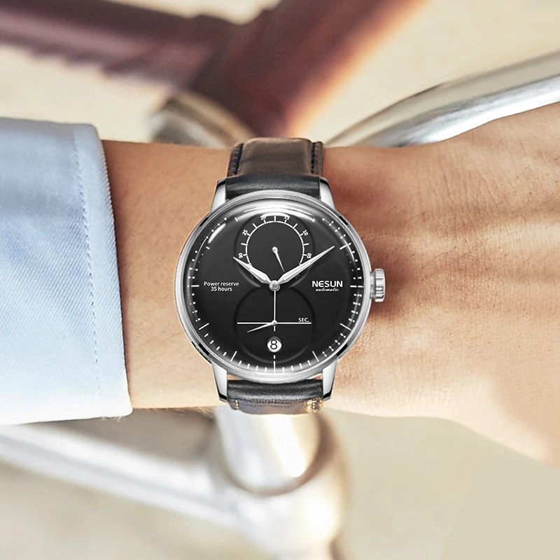 NESUN men's automatic mechanical watch, luminous fashion skeleton flywheel men's watch, calendar and day function