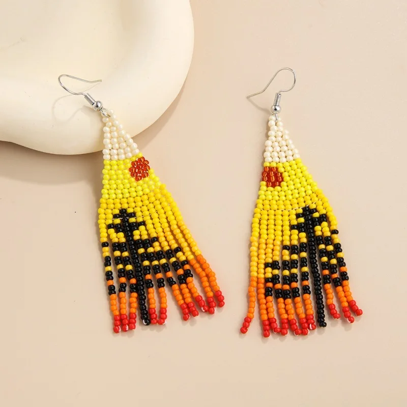 

Beaded earrings Tassel The tree Landscape painting Design Originality Hand knitting Bohemia Alloy Tide Simple Rice bead earrings