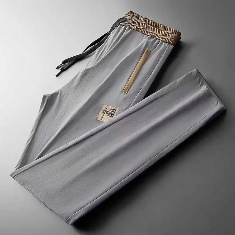 Summer lightweight Korean style trendy ice silk straight tube loose Chinese style elastic quick drying sports work pants