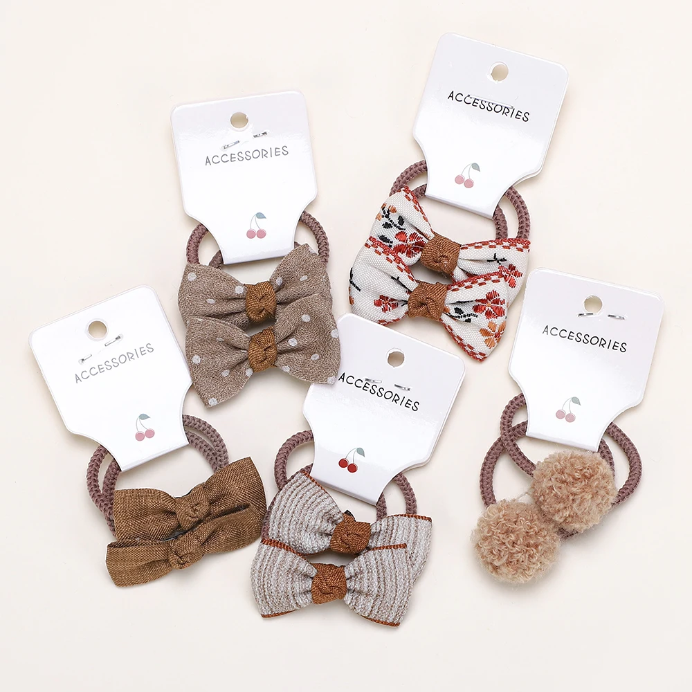 10 Teile/satz Baby Mädchen Bögen Haar Bands Cartoon Dot Bowknot Blume Kinder Haar Seile Handgemachte Gummiband Haar Zubehör