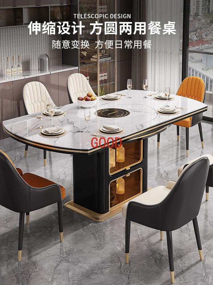 Легкий роскошный круглый обеденный стол из каменной плиты. Небольшая квартира со встроенной телескопической индукционной плитой с поворотным столом.