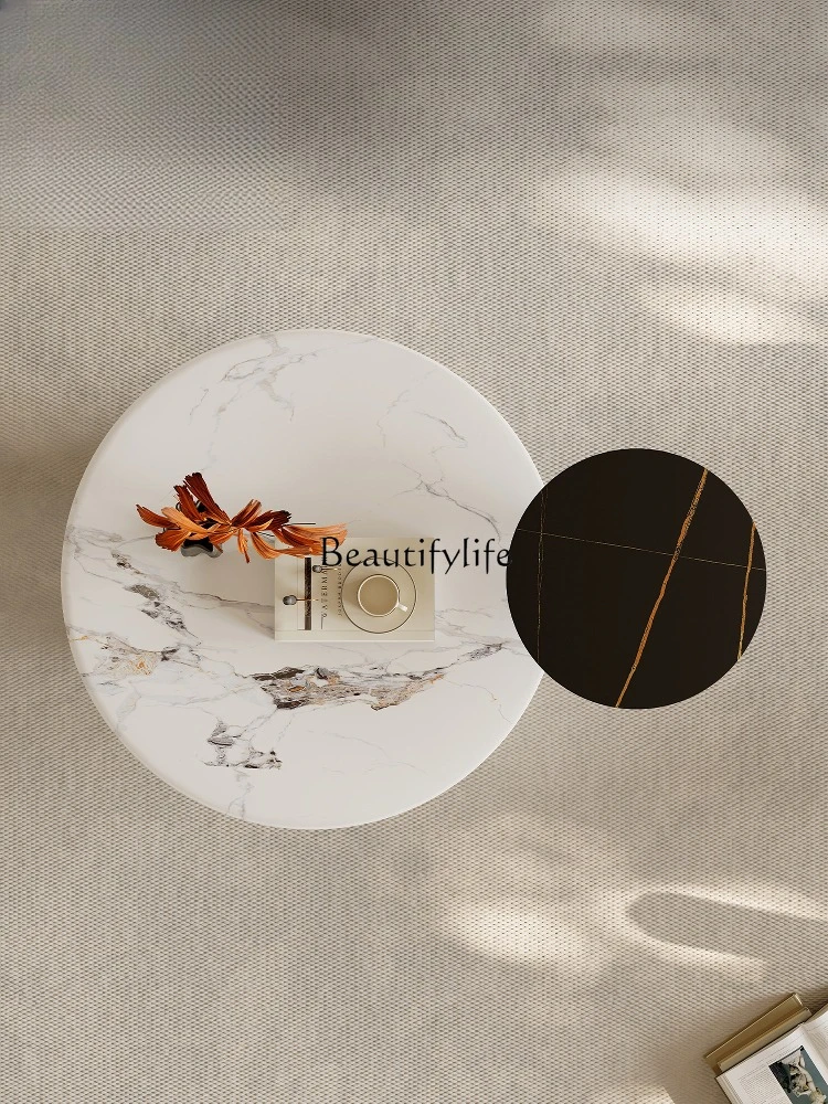 Moderne, schlichte Couchtischkombination aus Steinplatten