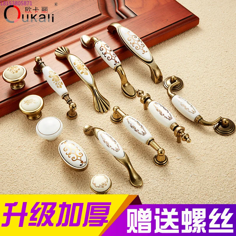 

Fine yellow ceramic handle, fake gold flower cross gold flower plate Qinggu single hole small handle