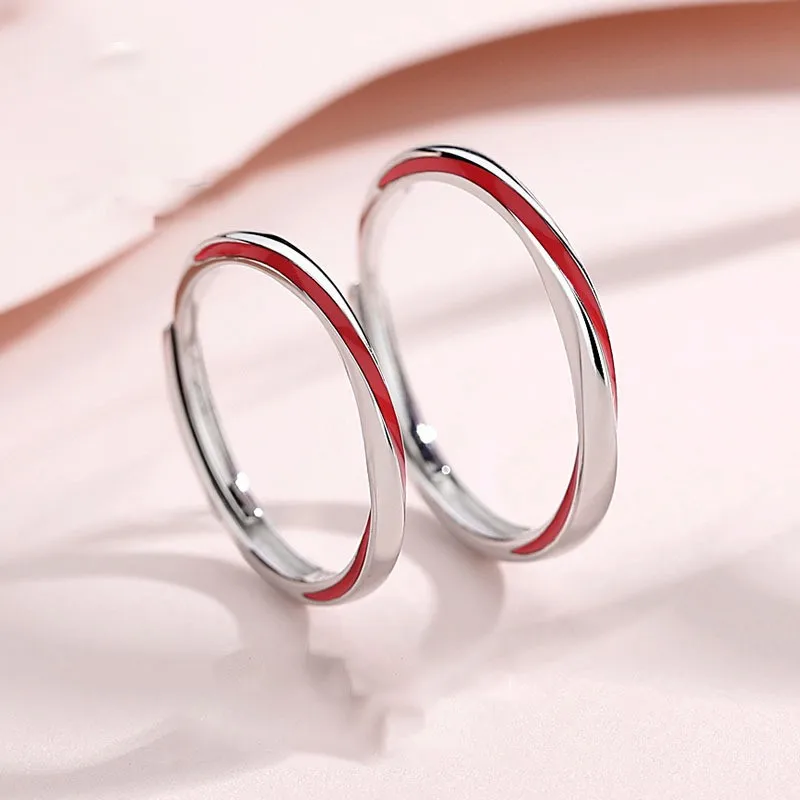 

S925 sterling silver plated 18K gold PT950 platinum red line couple ring with open enamel Mobius fashionable high-end ring