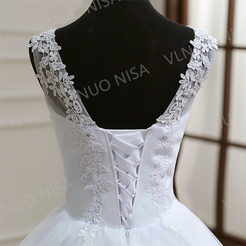 Mode klassische Luxus Spitze V-Ausschnitt Ballkleid weiß Brautkleider ärmellose Prinzessin Illusion Applikationen Brautkleid Casamento